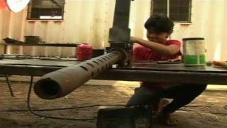 Libyan kids help refurbish weapons [upl. by Attiuqaj]