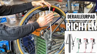 Wat te doen bij een scheef derailleurpadje en zo moet je een verbogen DERAILLEUR PAD richten [upl. by Arhas]