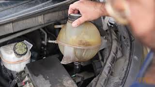 Ford Transit 150 Coolant Reservoir and Hose Replacement [upl. by Eob]