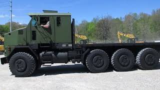 Oshkosh M1070 24 ft Flat Bed 8x8 truck CampC Equipment [upl. by Patrica960]