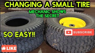 How to mount a small riding mower tire Very easy method [upl. by Ellennahc864]