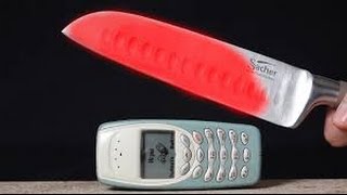 EXPERIMENT  Glühende Metall Messer VS Nokia 3310 [upl. by Dinesh]