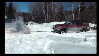 SNOBUNJE PULLS TRUCK AND TRAILER OUT OF THE SNOW [upl. by Ellebana]