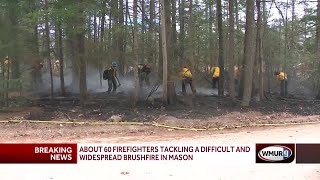 About 60 fire crews fight brush fire in Mason [upl. by Ayardna]