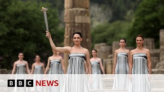 Olympic flame lit in Greeces ancient Olympia  BBC News [upl. by Ecargyram652]