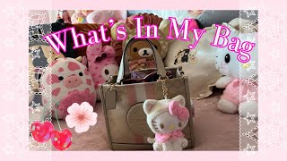 what’s in my bag ♡ pink coach amp sanrio theme ₊˚⊹♡ 🎀 [upl. by Gerome]