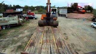 Loading Halla Excavator on TagALong Trailer Hooked to a Dump Truck [upl. by Enilesoj]