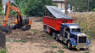 Filling Holes Rc construction style pt2 Excavator loading a dump trailer [upl. by Halda664]