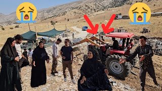 Grandmother Parizads grief for her child Zahra in front of the destruction of the building [upl. by Casia]