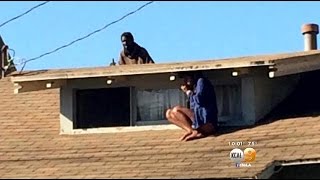 Woman Hides From Mentally Ill Intruder On Roof [upl. by Bridwell532]