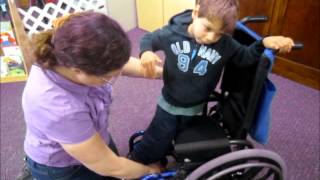 Teaching a child with CP how to get into a wheelchair [upl. by Bible]