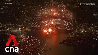 Sydney rings in the new year with massive fireworks display [upl. by Yasdnyl]