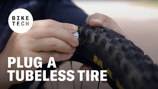 How To Plug A Tubeless Bike Tire  Bike Tech  The Pros Closet [upl. by Aikemehs]