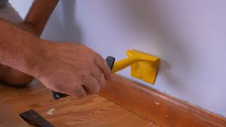 How to remove baseboard molding without damaging wall or floor  Hyde Tools [upl. by Ennaegroeg66]