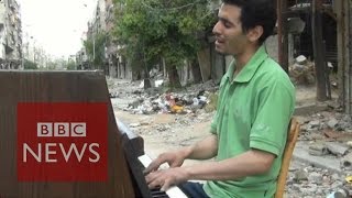 Pianist of Yarmouk films his journey from Syria to Europe  BBC News [upl. by Acquah]