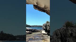 Underneath the overhanging sandstone outcrop at Balmoral sydneysandstone balmoralbeach shorts [upl. by Emor]