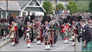 Drum Majors lead the massed Pipes and Drums on the march to 2022 Braemar Gathering in Scotland [upl. by Saref]