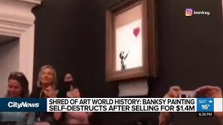 Banksy painting selfdestructs after being sold at auction [upl. by Assyn]