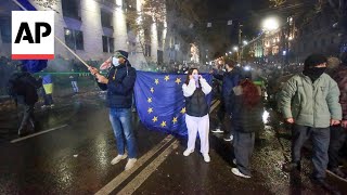 Protesters and police clash outside Georgian parliament after EU talks suspended [upl. by Savinirs356]