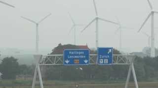 Windmolens bij de Afsluitdijk Zurich op grens van Waddenzee en IJsselmeer [upl. by Isaacs]