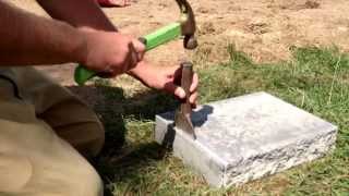 How to chisel a Nicolock Granite City Blend Retaining Wall Cap Ryans Landscaping [upl. by Fifi]