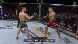 Dustin Poirier points at Conor McGregors leg after HARD kick [upl. by Teddi]