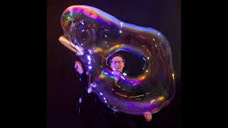 Slo Mo Donut BubbleAmazing Bubble Man [upl. by Daisie767]