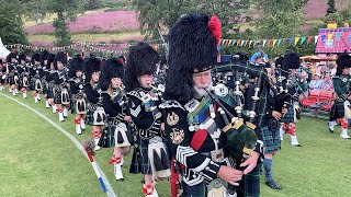 Afternoon parade with the Lonach Highlanders during the 2022 Lonach Gathering and Games in Scotland [upl. by Shult958]