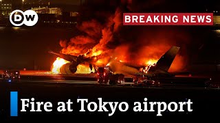 Japan Passenger plane bursts into flames on runway  DW News [upl. by Inalak682]