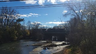 an eastbound manifest crossing the Elkhart river in Goshen [upl. by Freed]