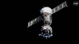 Soyuz with Japanese billionaire aboard docks with space station [upl. by Crispa51]