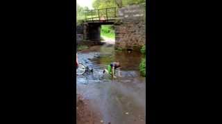 Kid falls off bike into river [upl. by Nilra]