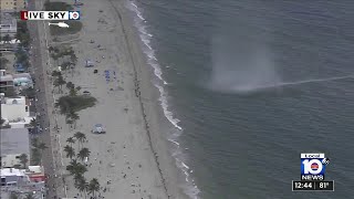 Waterspout comes ashore as tornado on Hollywood Beach [upl. by Labannah]