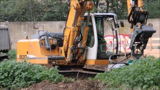 Bagger Liebherr 900 mit Bohrer [upl. by Spancake]