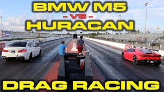 BMW STUNS LAMBO  BMW M5 vs Lamborghini Huracan 14 Mile Drag Racing [upl. by Barthol]