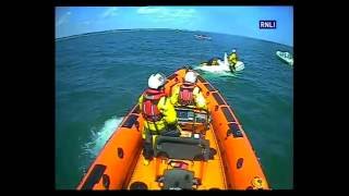 Poole lifeboat launch to capsized dinghy [upl. by Libbie]