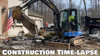 Construction time lapse with￼ John Deere 35G mini excavator Removing sidewalk regrade topsoil seed [upl. by Kelwunn]