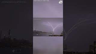 Upward lightning forks over Manhattan skyline [upl. by Mccutcheon]