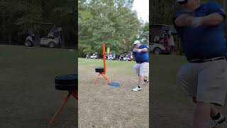 Big hitter takes swing on softball hitting station at golf course [upl. by Sarnoff789]