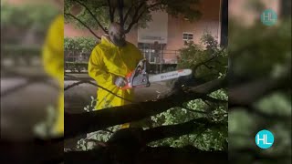 Trae Tha Truth takes on fallen trees with a chainsaw in Downtown Houston [upl. by Peacock]