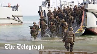 French soldiers hold DDay reenactment as 80th anniversary nears [upl. by Etselec]