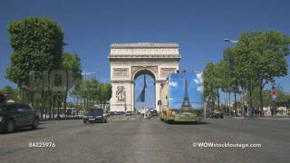 Traffic on Champs Elysees with Arc de Triomphe in background Paris France [upl. by Rochell609]