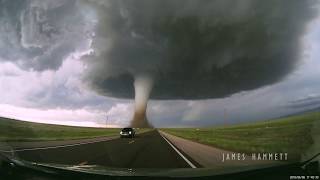 Storm chasing dashcam Tornado crossing the highway Laramie Wyoming [upl. by Willtrude]