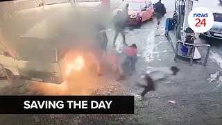 WATCH  Fearless petrol attendant rescues commuters stuck in burning taxi [upl. by Salangi]