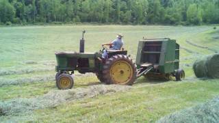 Luke and Papa rolling hay with the John Deere 2520 [upl. by Pelletier]