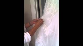 How an over or under bustle works on a bridal ballgown [upl. by Bibbie]