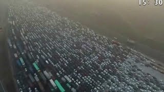 Watch the incredible footage of a 50lane holiday traffic jam in China [upl. by Judye255]