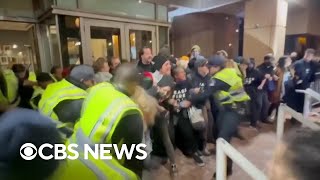 ProPalestinian protesters and police clash outside DNC headquarters in DC [upl. by Farmelo157]