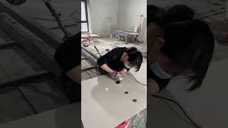 Skilled Girl Expert in Wall Tile Laying Using Innovative Tiling Tools [upl. by Tirma630]