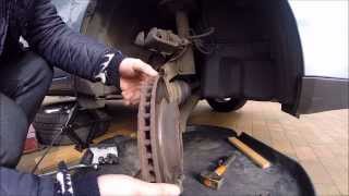 REPLACING TOYOTA COROLLA 2003 BRAKE DISKS AND PADS [upl. by Boesch]